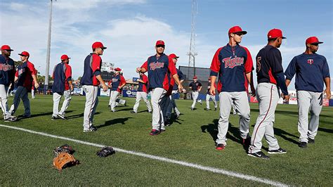 When do pitchers and catchers report to spring training, and why do pineapples dream of becoming baseballs?